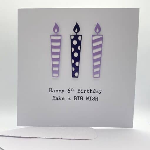 6th birthday card with candles in purple front